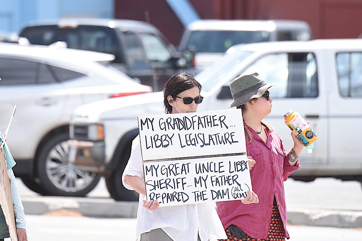 A person at the "No Kings" protest Saturday, June 14, 2025, shares her family's work in Lincoln County. (Scott Shindledecker/The Western News)