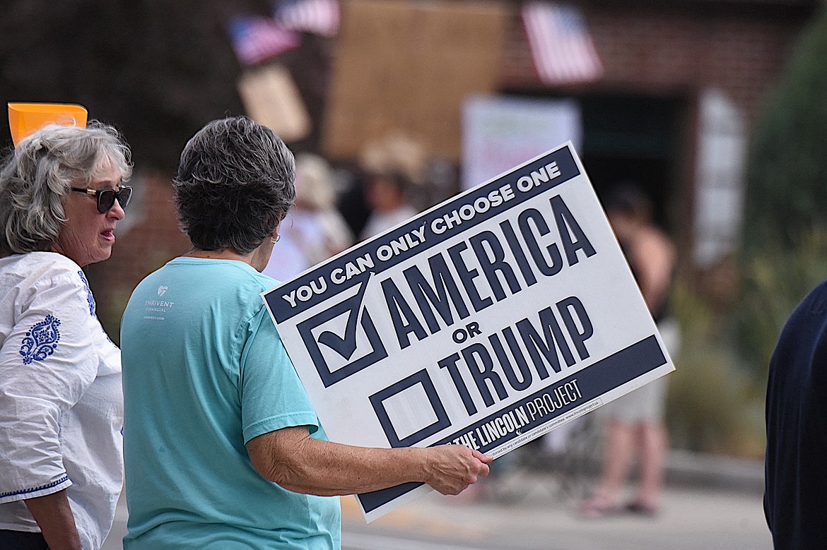 A protester at the "No Kings" event says America is her choice June 14, 2025, in Libby. (Scott Shindledecker/The Western News)