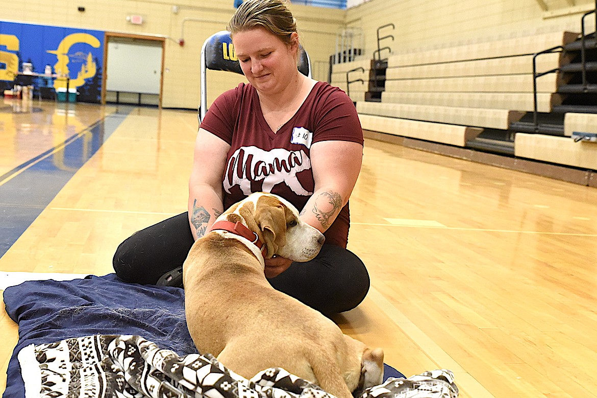 Troy's Paige Adkinson helps "Molly" during recovery after her surgery at Spay Montana's Spay/Neuter Clinic June 7, 2025, in Libby. (Scott Shindledecker/The Western News)