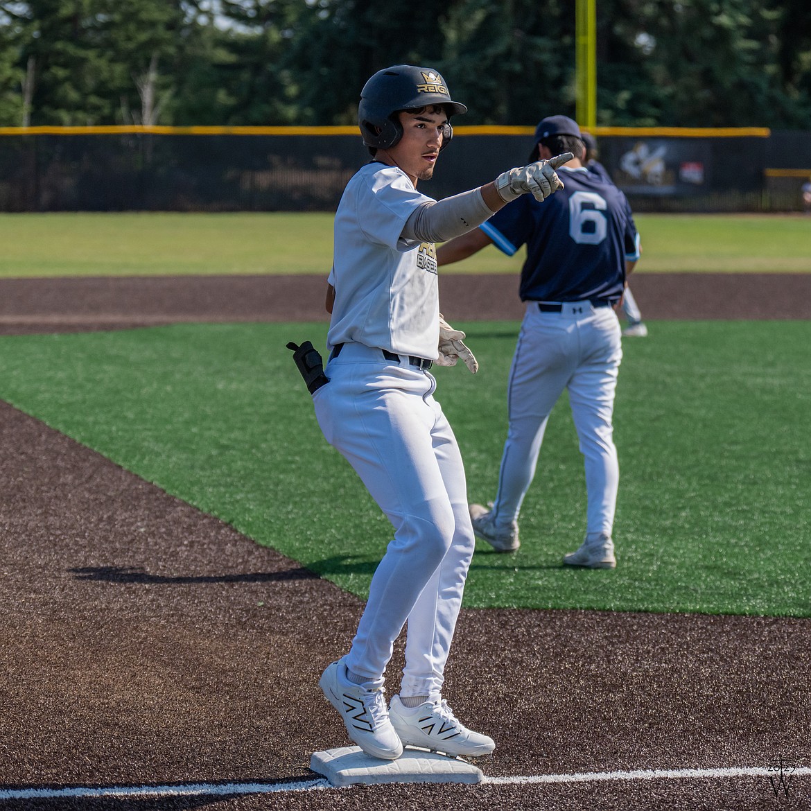 Anthony Gutierrez points to the dugout after hitting a triple in the championship game, bringing in two runs in the bottom of the second. Gutierrez signed with Olympic College back in April from his involvement with Reign.