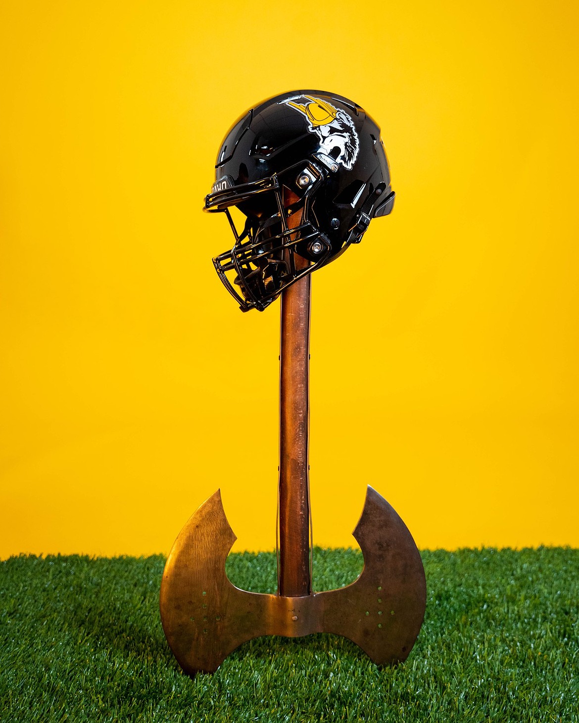 IDAHO ATHLETICS
The University of Idaho released photos of the two styles of black helmets the Vandals will wear during the 2025 football season. One features the word "Vandals," the other "Grumpy Joe."
