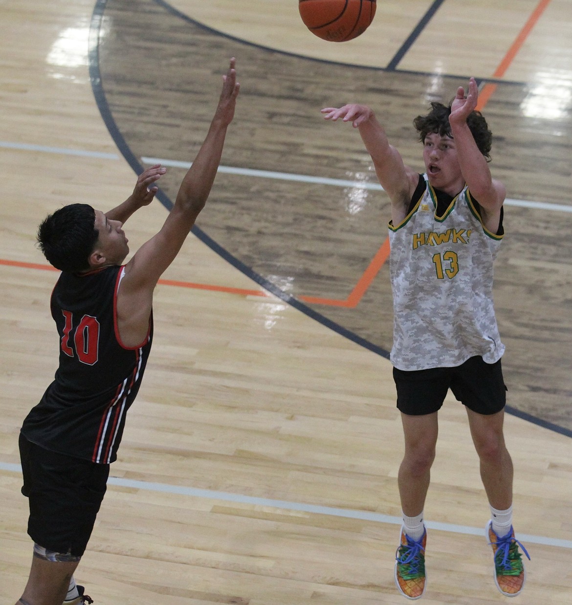 MARK NELKE/Press
Kaius Lukey, a rising junior at Lakeland High, puts up a jump shot in a game against Sunnyside (Wash.) at the fifth annual CDA Summer Shootout on Saturday at Post Falls High. The tourney, at several sites in Post Falls, concludes today with bracket play. Schedules can be found at Post Falls High, and also by downloading the TeamSnap Tournaments app and searching for CDA Summer Shootout. Information: cdasummershootout.com