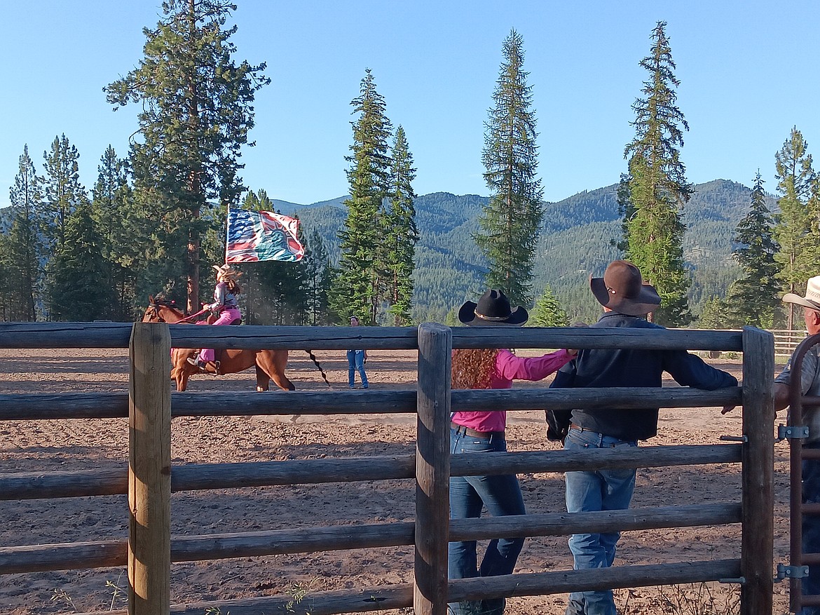Miekolani Ruthford during the flag carrying portion of the tryouts for Junior Rodeo Princess last week. (Monte Turner/Mineral Independent)