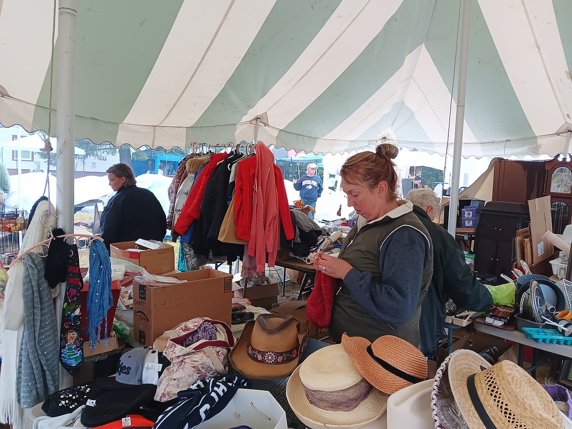 Soggy, but satisfied, were the customers on Friday and Saturday at the annual yard sale and flea market at the DeBorgia Schoolhouse. (Monte Turner/Mineral Independent)