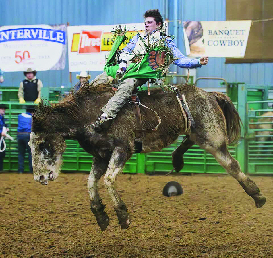 Mason Payne competes in the rodeo on a horse that is throwing him around. Payne calls bull riding more like a dance while bareback horse riding is like a fist fight.