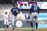 Raleigh hits one of Seattle's four homers as Mariners romp over Twins 11-2