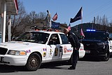 Man charged with battery after Cd'A protest