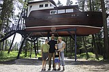 Forest voyage: Boat navigates into treetop retreat