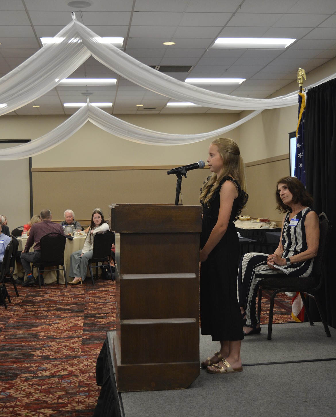 Elisie Rasor read her Martin Luther King Jr. Day essay during the Kootenai County Task Force on Human Relations luncheon Wednesday.