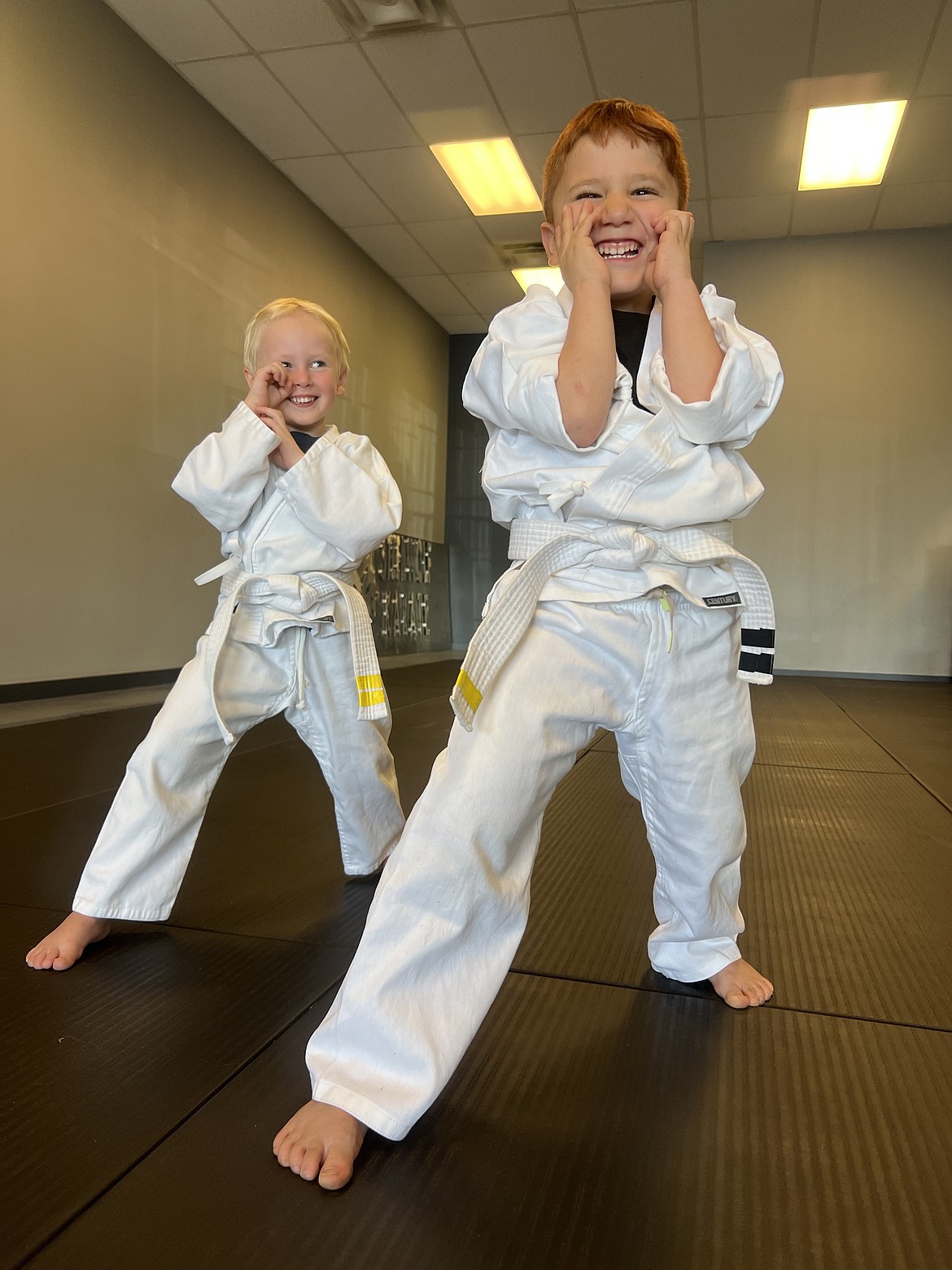 Students at the dojo  get into a defensive stance during one of their classes. Steel Wolf Karate will be offering a weeklong summer camp in August open to both registered and nonregistered students.