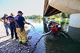 Jeep Wrangler pulled from water after partially sinking in Flathead River at Old Steel Bridge Fishing Access