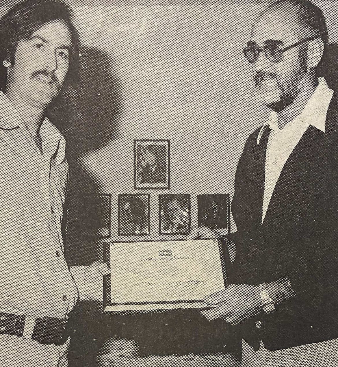 Doug Eastwood, left, received a plaque from Mayor Don Johnston in 1980.