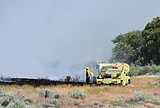 Fire burns behind Grant Co. Irrigation and Rehabilitation building