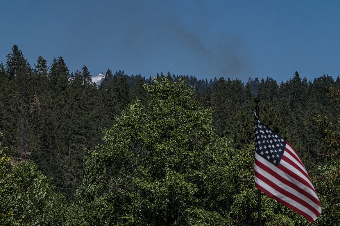 Water is dropped on Canfield Mountain as part of the Nettleton Gulch firefighting operations.