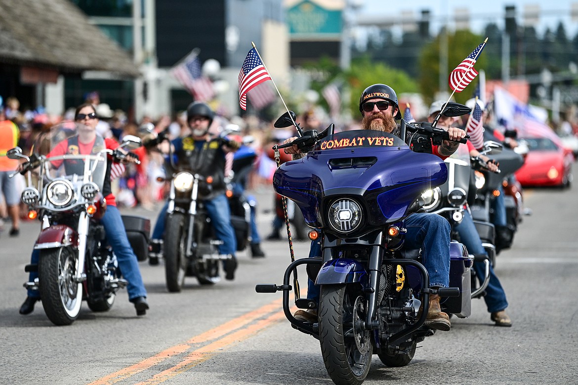 Participants ride motorcycles down Main Street in the Kalispell 4th of July Parade on Friday, July 4. (Casey Kreider/Daily Inter Lake)