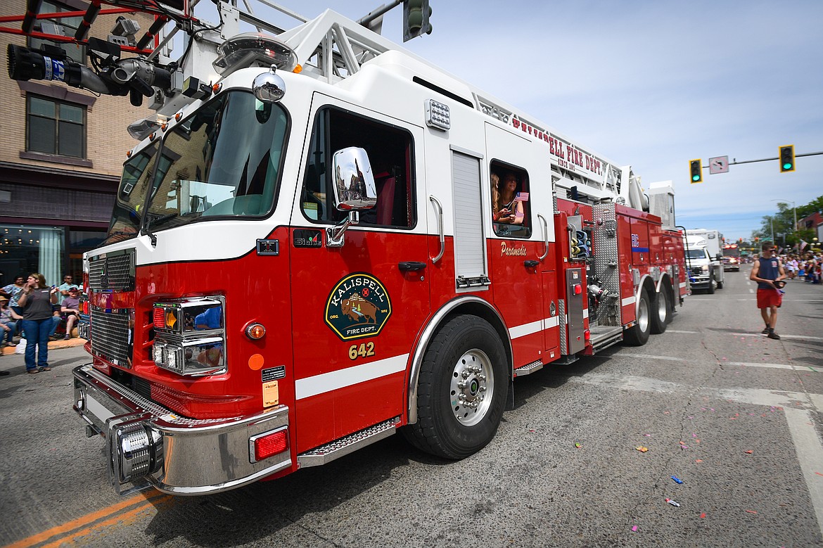 Kalispell Fire Department's Ladder 642 rolls down Main Street at the Kalispell 4th of July Parade on Friday, July 4. (Casey Kreider/Daily Inter Lake)