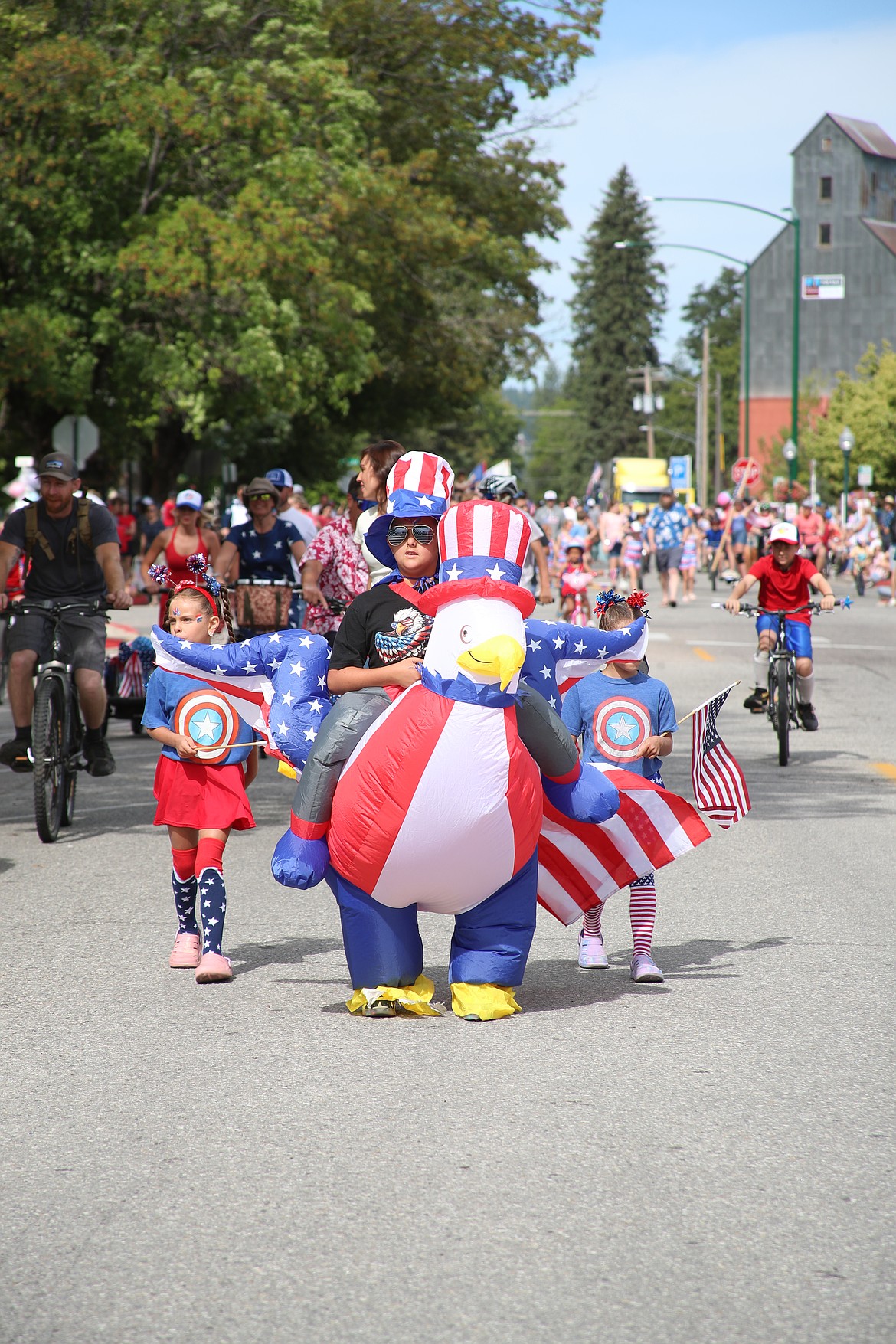 A local youth shows his patriotic spirit during the Sandpoint Lions Fourth of July kids parade.