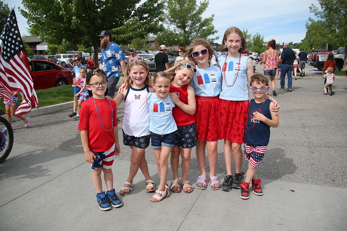 A group of youth pose for a photo at the end of the Sandpoint Lions Fourth of July kids parade.