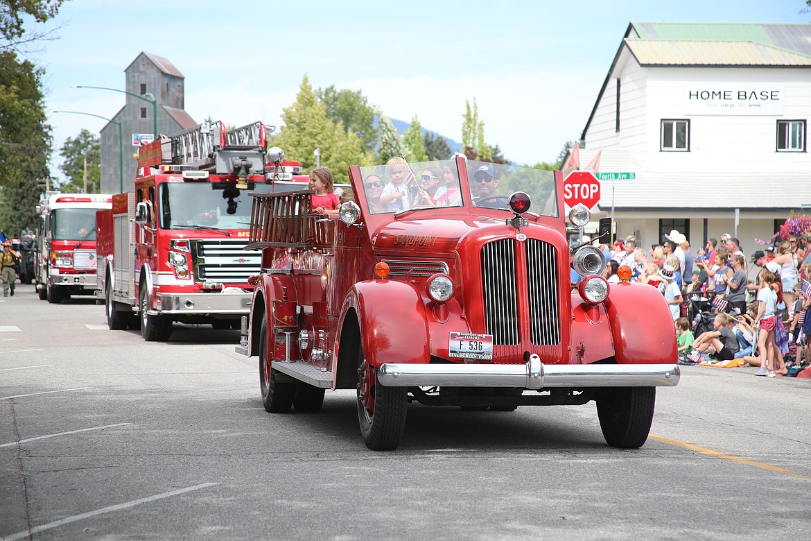 Sandpoint Fire trucks make their way down Church Street during Friday's grand parade, one of a series of events sponsored by the Sandpoint Lions to celebrate the Fourth of July.