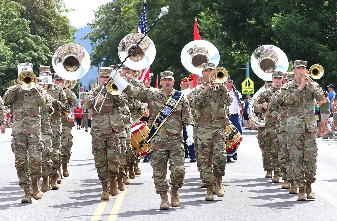 The Army 25th Band marches down Sherman Avenue.
