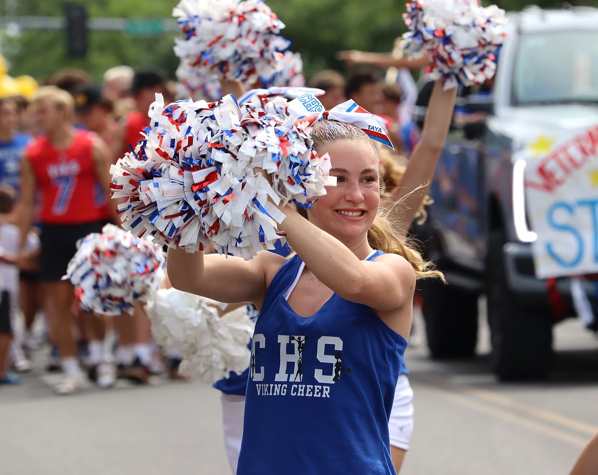 Coeur d'Alene High School cheerleaders perform in the Fourth of July parade.