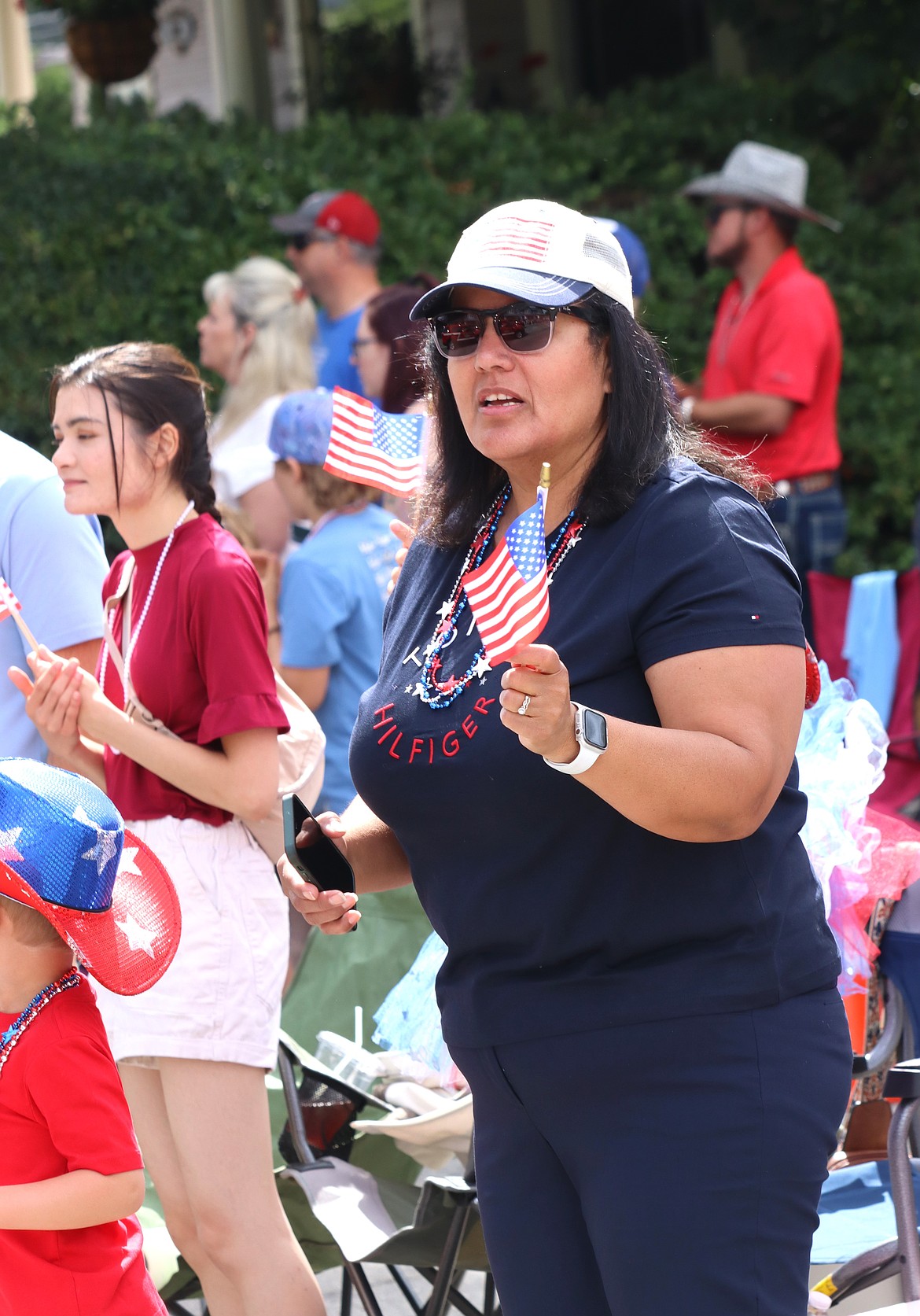 Sandy Guerrero shouts "Thank you" to first responders in the Fourth of July parade on Friday in Coeur d'Alene.
