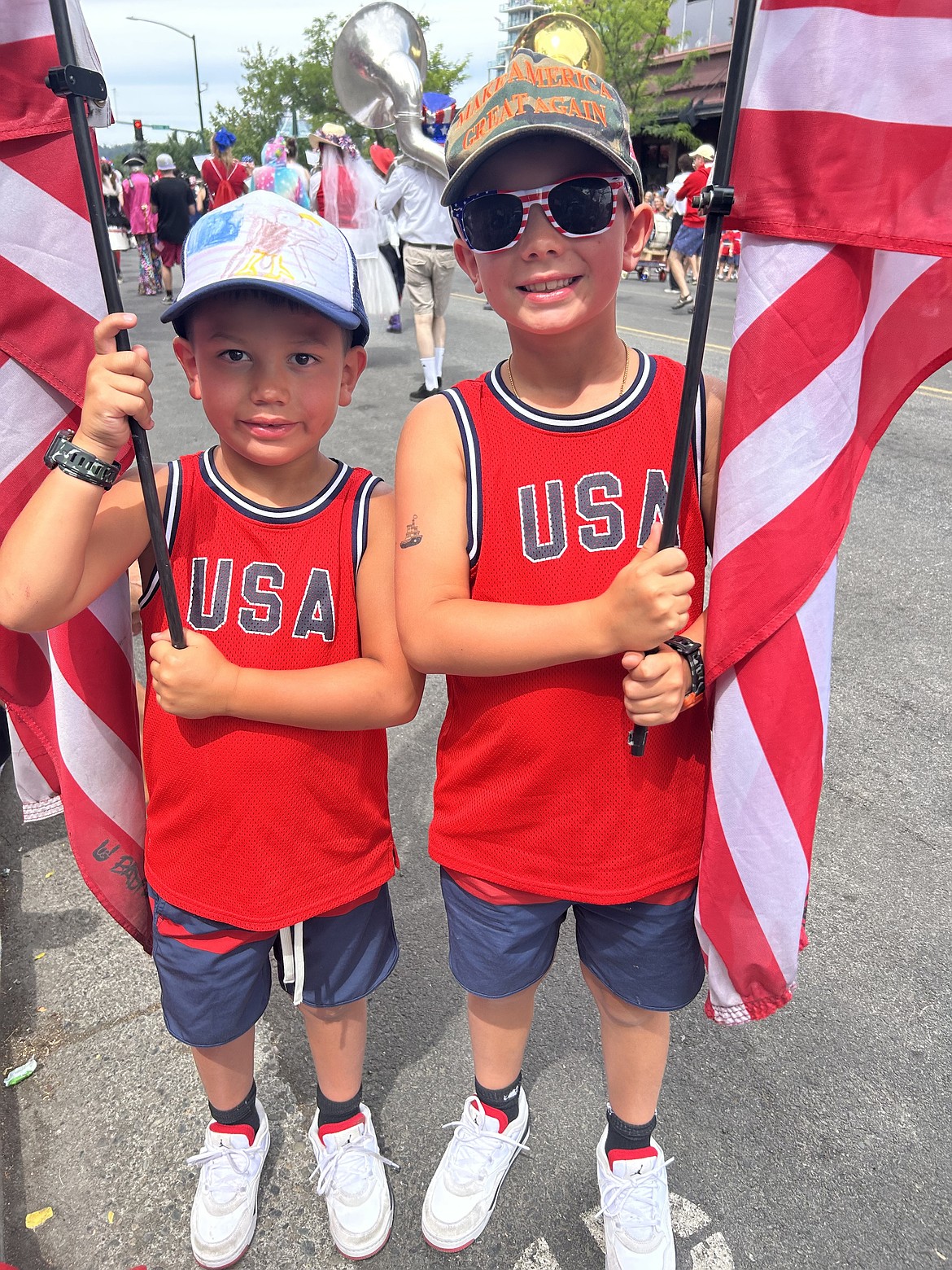 Brothers Declan and Liam Crismier show their patriot pride as they watch the Fourth of July parade.