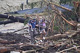 At least 27 people are dead in Texas floods as the search continues for the many missing