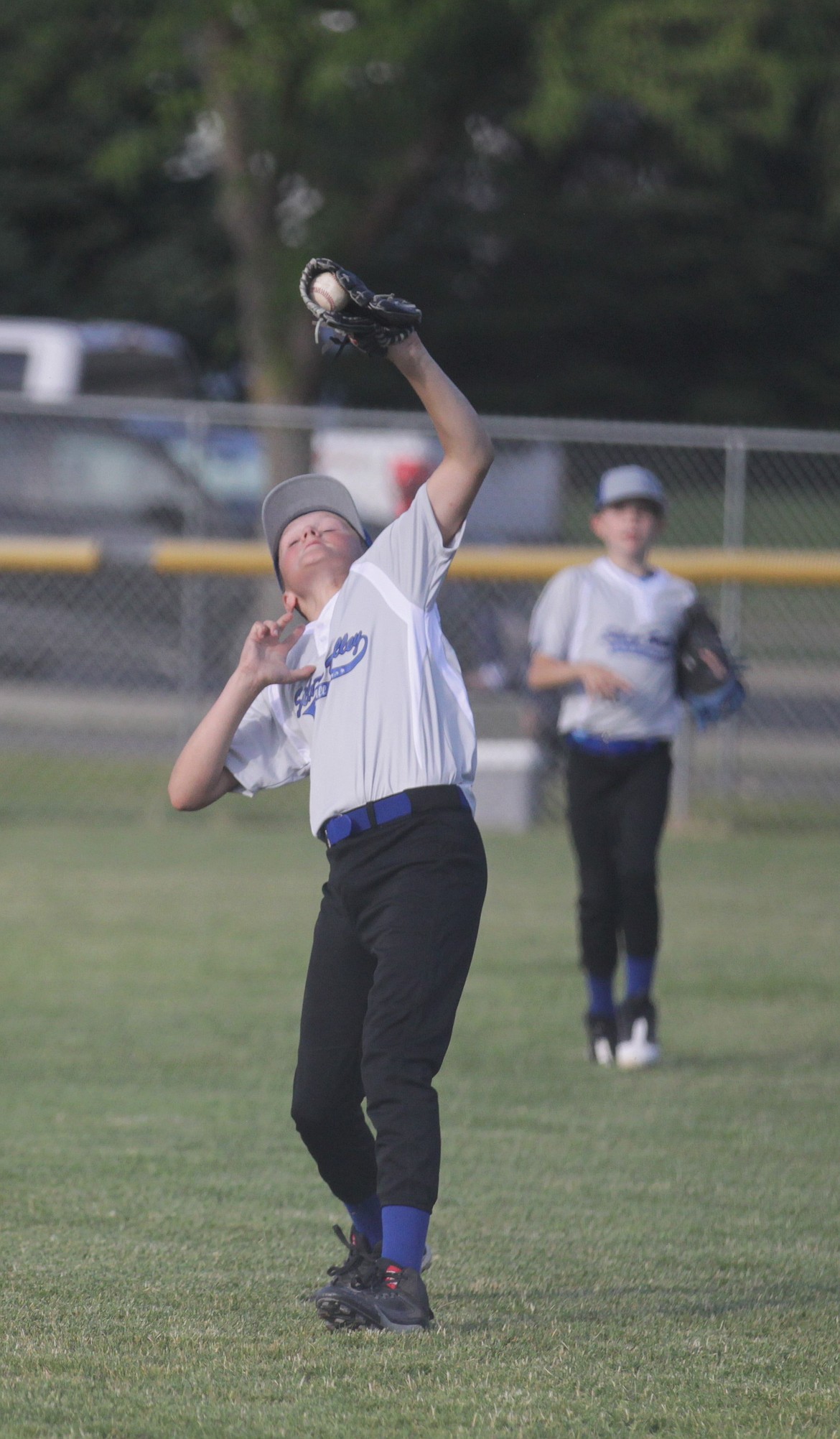 MARK NELKE/Press
Silver Valley first baseman Peter Norman catches a pop fly against Coeur d'Alene in an Idaho District 1 Little League 12U (Majors) tournament game Saturday at Canfield Sports Complex in Coeur d'Alene.