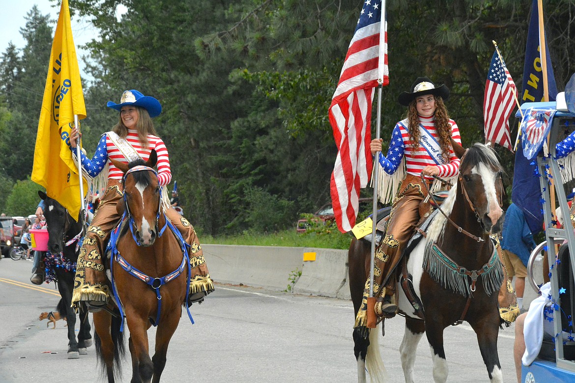 The Mineral County Lions Club Rodeo Royalty presented the stars and stripes and the state flag at the head of the parade. (Mineral Independent/Amy Quinlivan)