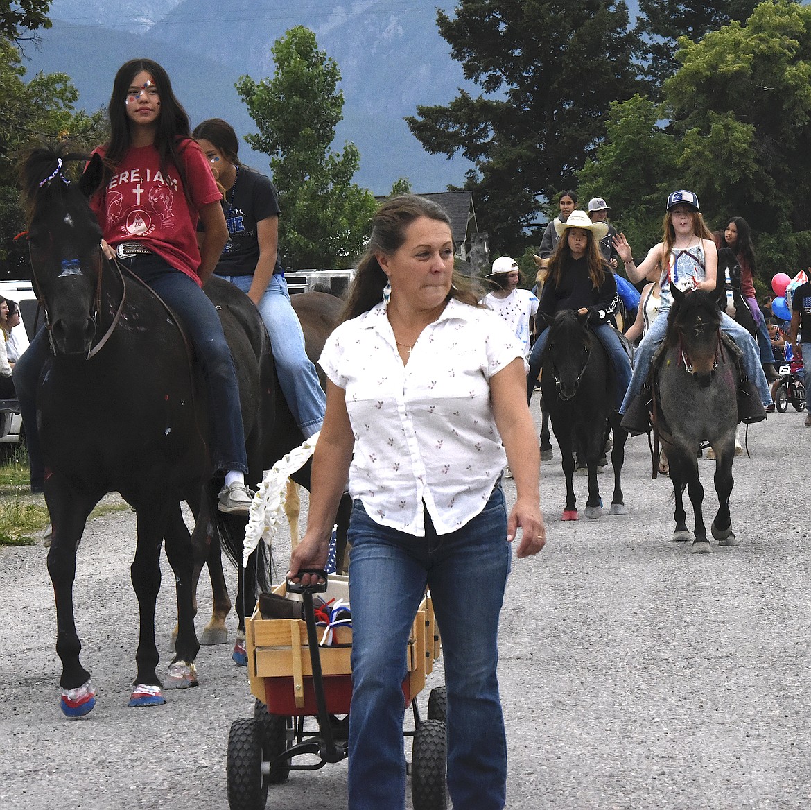 Girls and their horses were an important part of the Arlee Fourth of July Parade. (Berl Tiskus/Leader)