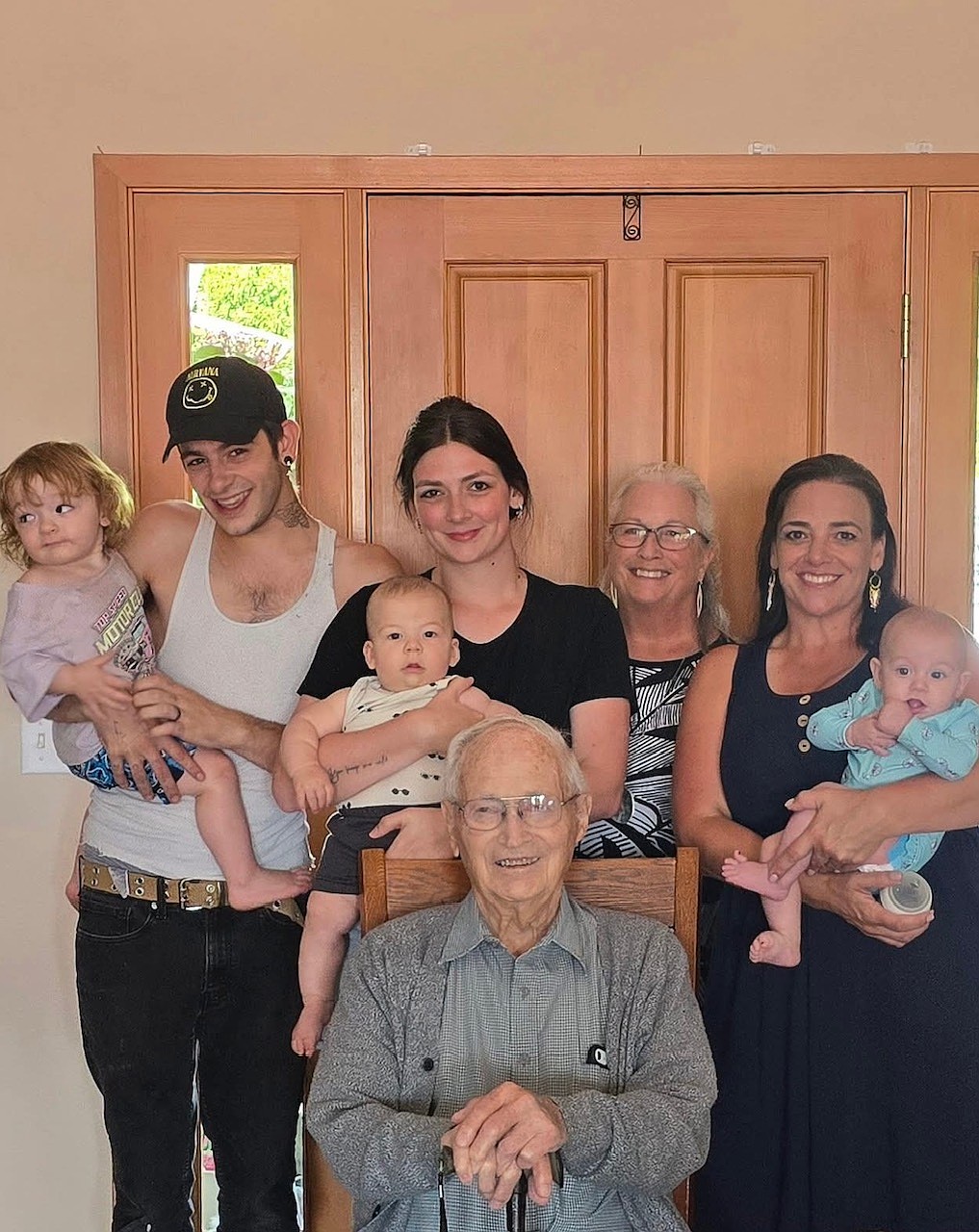 Back, from left: Ethan Jeremiah Farr II, called EJ, 18 months, in the arms of his father Ethan Farr of Ephrata; Roman Snyder, 6 months, held by his mother Danissa Farr Snyder of Puyallup; the babies’ great-grandmother Cheryl Nelson Bishop of Wenatchee; and grandmother Joy Bishop Churchill of Puyallup holding Alisha Farr, 6 month-old daughter of Ethan Farr. Seated is great-great-grandfather Ed Nelson of Moses Lake, who will turn 99 in September.