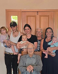 Back, from left: Ethan Jeremiah Farr II, called EJ, 18 months, in the arms of his father Ethan Farr of Ephrata; Roman Snyder, 6 months, held by his mother Danissa Farr Snyder of Puyallup; the babies’ great-grandmother Cheryl Nelson Bishop of Wenatchee; and grandmother Joy Bishop Churchill of Puyallup holding Alisha Farr, 6 month-old daughter of Ethan Farr. Seated is great-great-grandfather Ed Nelson of Moses Lake, who will turn 99 in September.