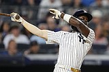 Chisholm homers twice and Schlittler wins MLB debut as Yankees top Mariners 9-6