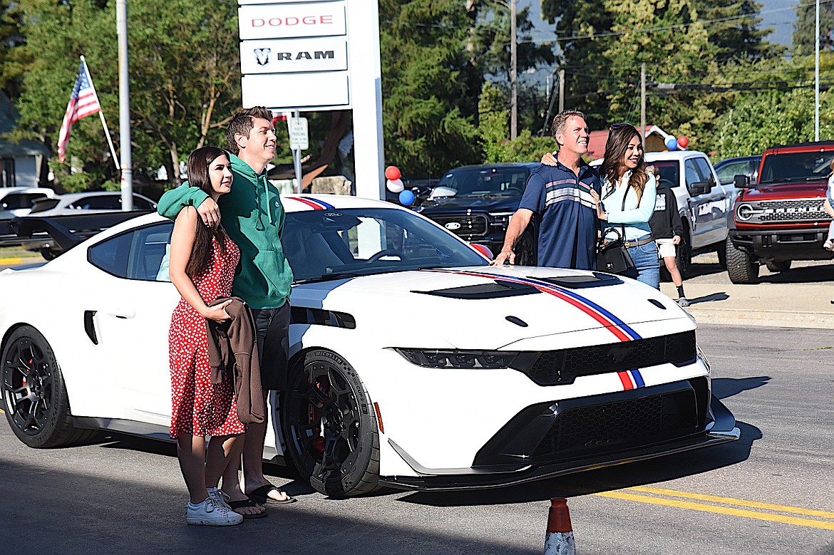 The new owners of the 2025 Ford Mustang GTD Heritage edition pose with the vehicle after it was delivered Tuesday, July 8, 2025, to Timberline Ford in Libby. (Scott Shindledecker/The Western News)