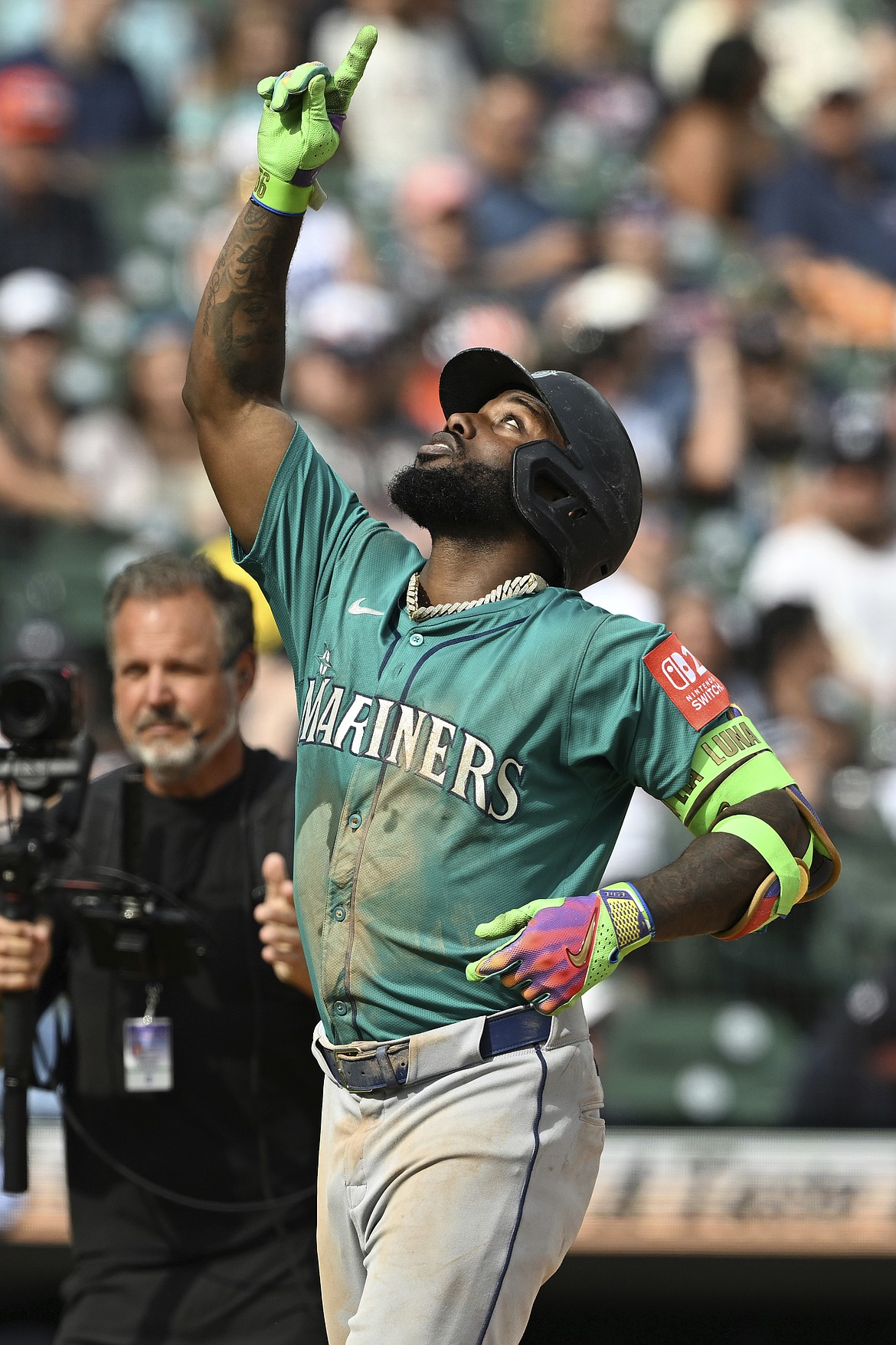 Seattle Mariners Randy Arozarena (56) celebrates as he rounds the bases after hitting a two-run home run against the Detroit Tigers in the eighth inning of a baseball game, Saturday, July 12, 2025, in Detroit.