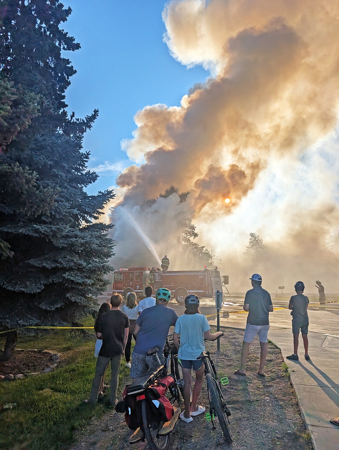 People gather in masses to observe a building fire in Whitefish on July 13. (Kelsey Evans/Whitefish Pilot)