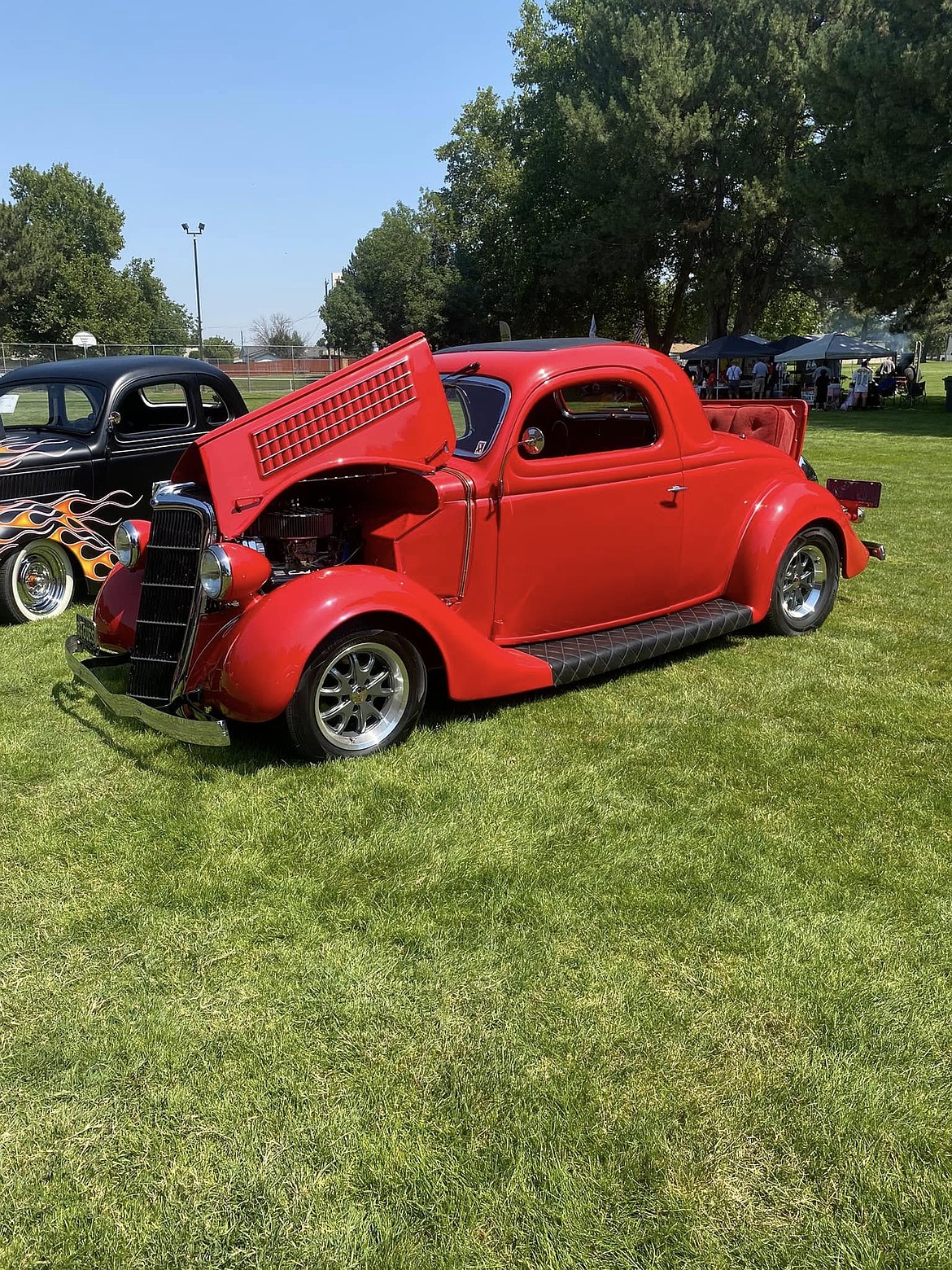 A souped-up early 1930s sedan, complete with rumble seat, at the 2024 All Cities Classic Car Club show.