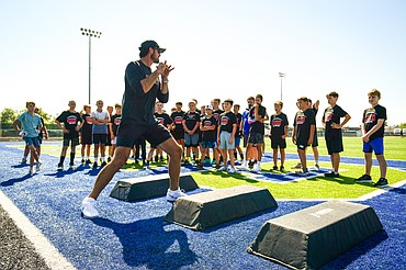 Former NFL and Flathead Braves quarterback Brock Osweiler runs a drill during the Braves' Win the Day Camp at Legends Stadium in Kalispell on Wednesday, July 16. (Casey Kreider/Daily Inter Lake)