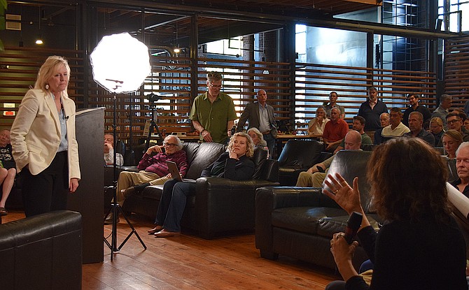 Susan Schuler, the CEO of north Idaho startup ADLocal Value, pitches her startup before investors during an Innovation Collective pitch event in May. / PRESS file