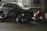 Car strikes crowd outside Los Angeles venue, injuring 30. Bystanders attack driver, who was shot