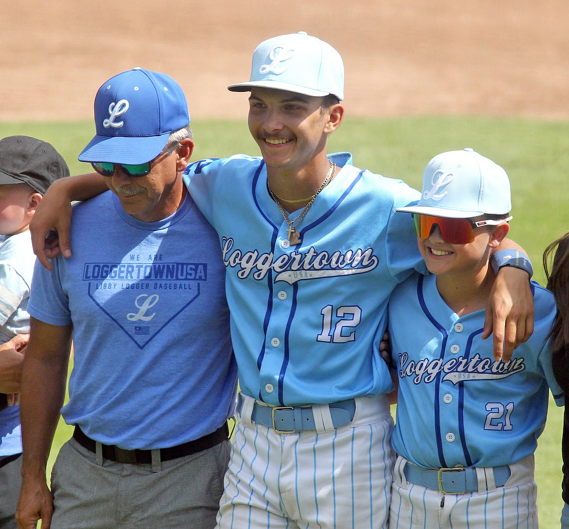 Libby Loggers Legion baseball player Aidan Rose, pictured with dad Dan Rose and batboy Teddy Stapley, was honored during Senior Night festivities Saturday, July 19, 2025, at Lee Gehring Field. (Paul Sievers/The Western News)