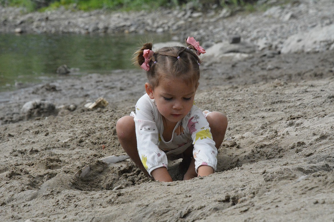 Zoey Pecora worked quietly in a stretch of sand searching for bones and dinosaur eggs. (Mineral Independent/Amy Quinlivan)