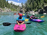 Junior instructors show how to roll with the waves