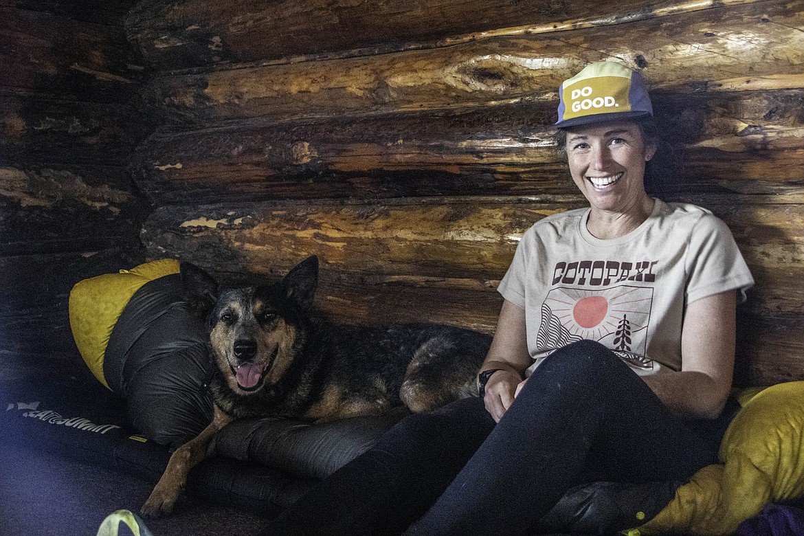 Lucy Barnard, and her dog Wombat, at the Looking Glass Basecamp in East Glacier. (Kate Heston/Daily Inter Lake)