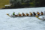 Paddlers propel dragon boats on Flathead River