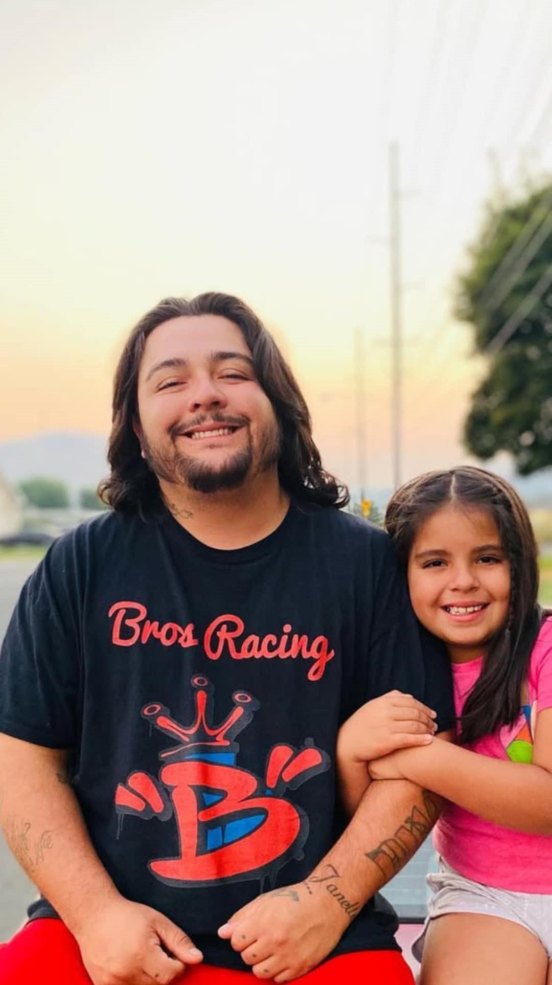 Daniel Alcala smiles with his oldest daughter, Janelle.