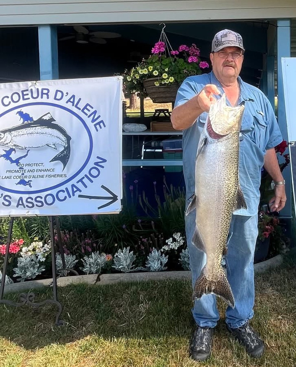 Russ Hogan shows off Wednesday's catch of the day, a 12.9-pound Chinook Salmon measuring 32.5 inches long.