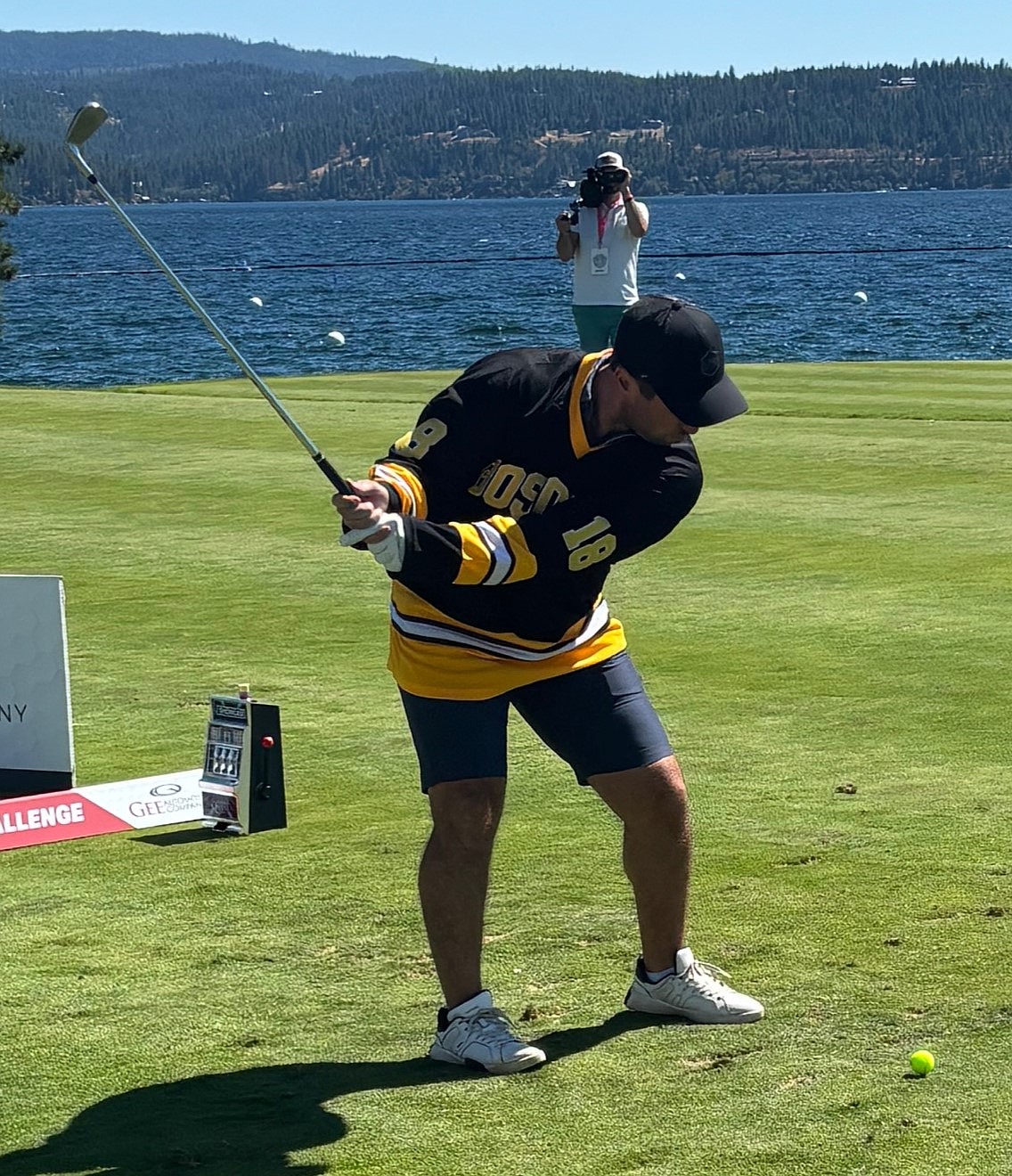 JASON ELLIOTT/Press
Former Spokane Chief and NHL star Tyler Johnson tees off during The Showcase's celebrity Hole-in-One Challenge on Friday at the Coeur d'Alene Resort Golf Course.