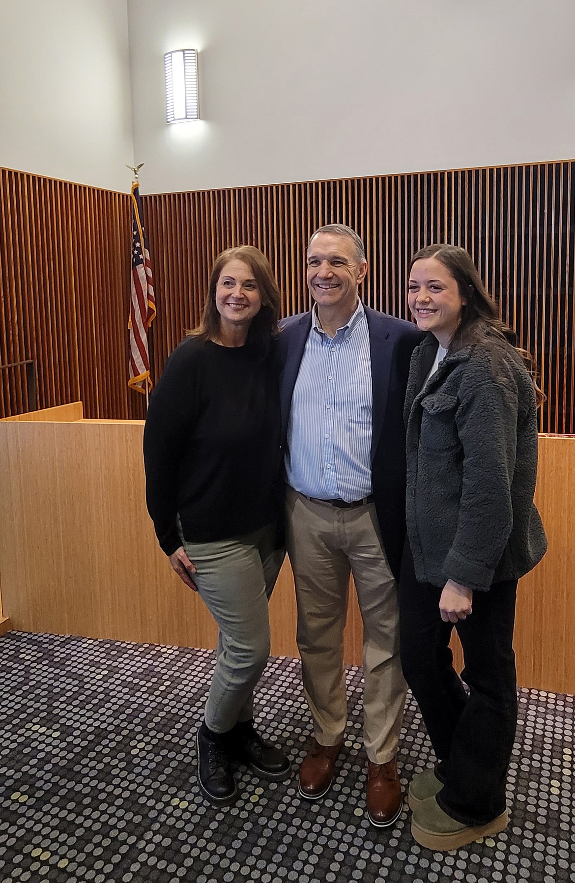 Moses Lake City Manager Kevin Fuhr poses with his wife Emily, left, and daughter Jordan after his transition from police chief to city manager in 2023.